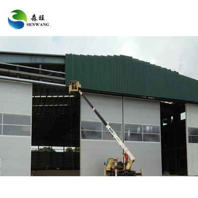 Bức tường sandwich Hangar máy bay với cửa nâng dọc và tuân thủ tải độ động đất cho bãi đậu máy bay an toàn
