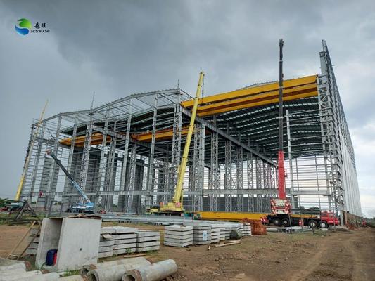 Cơ cấu thép bền kho và hangar được làm từ thép hạng Q235/Q355 với hệ thống cách nhiệt tùy chọn và nền tảng bê tông